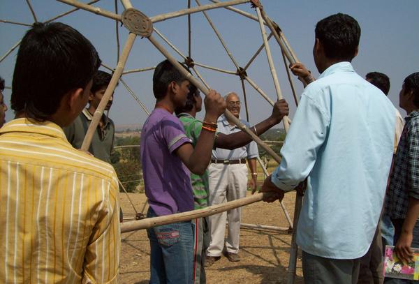 Students looking at the previously built bamboo dome at Vigyan Ashram, Pabal